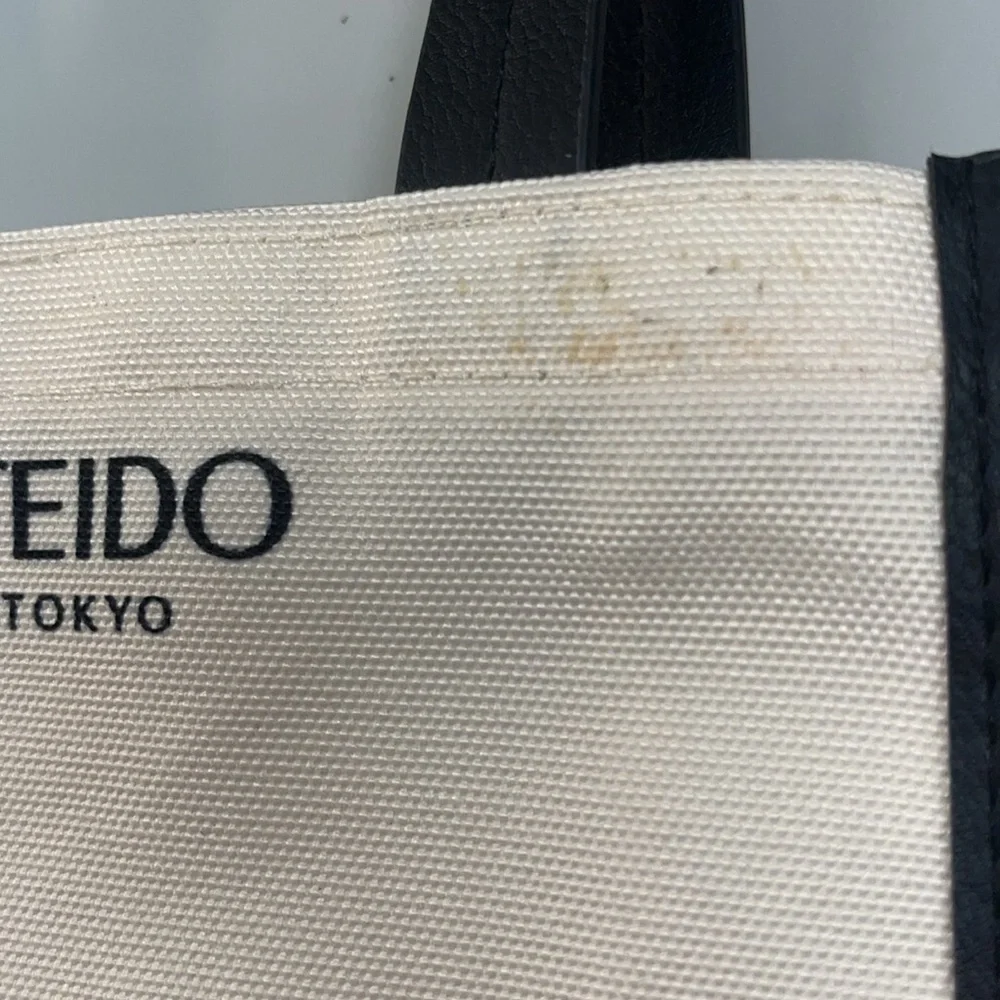 Shiseido small cream / black tote with handles, preowned